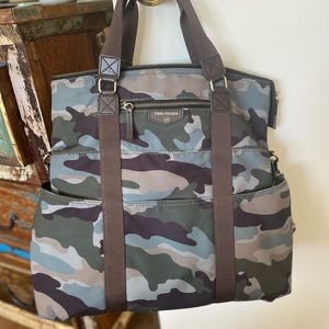 Stylish bag by 12little. Tote handles and can also function as a back pack.